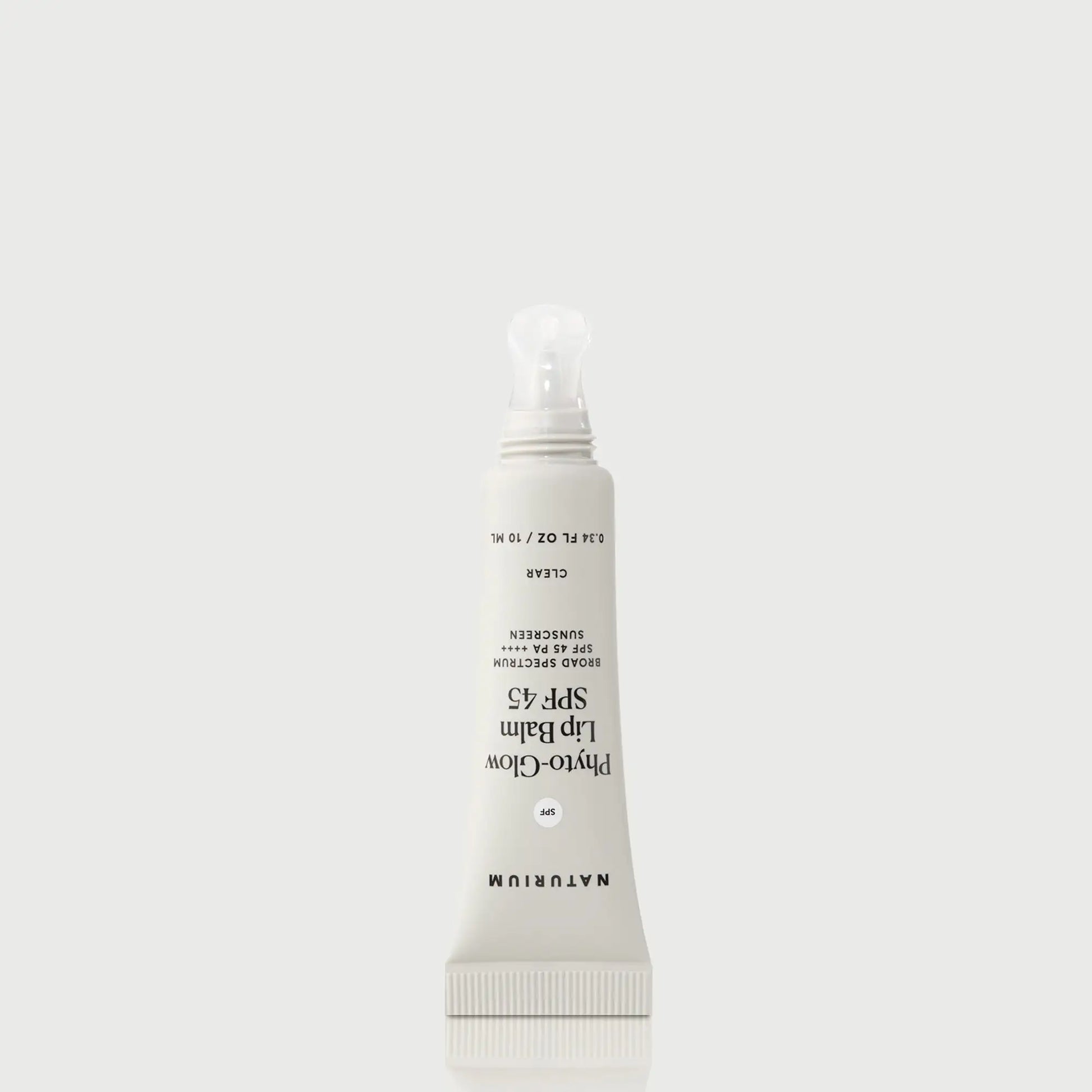 phyto-glow-lip-balm-spf-45-clear-u4 NATR-10124_PhytoGlow_SPF_Clear_primary_nocap_bonebkgd_1.webp
