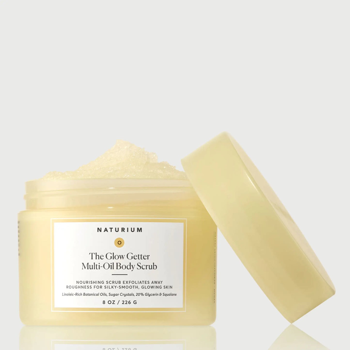 the-glow-getter-multi-oil-body-scrub-v8 NATR-40028-GlowGetter-Multi-Oil-Body-Scrub-Front-CapOff-bonebkgd.webp